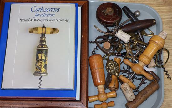 A collection of 19th/20th century corkscrews and two reference books,